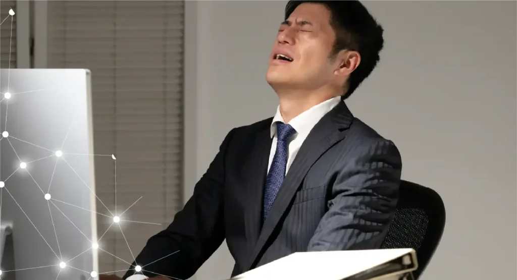 悩むビジネスマン